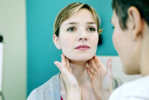 woman getting checked for Oral Cancer